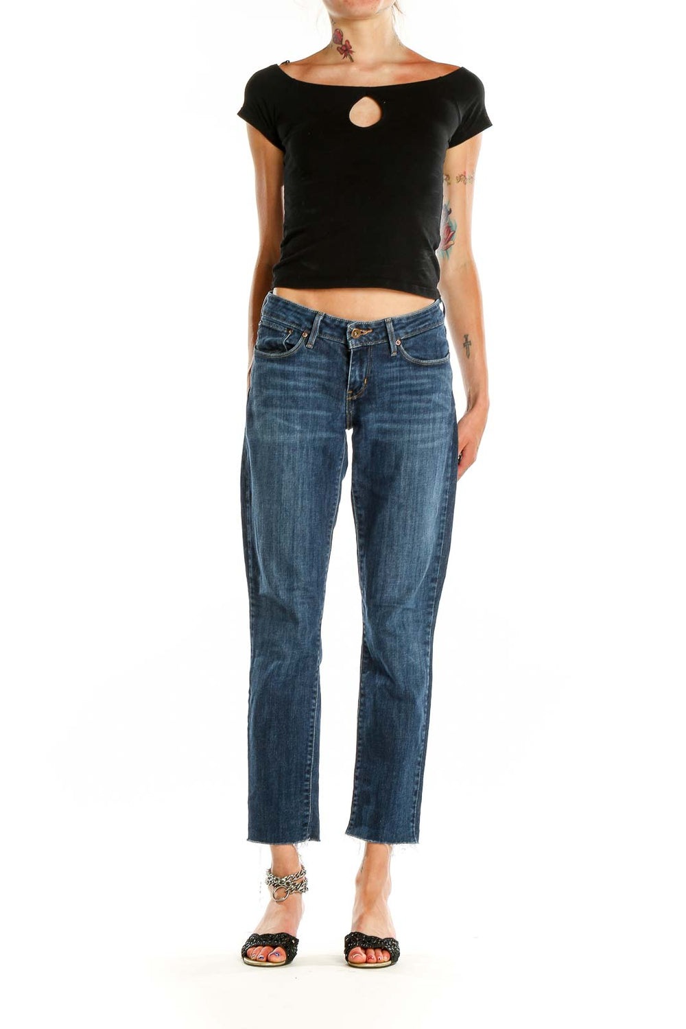 Front view of Levi's blue cropped straight-leg jeans on model