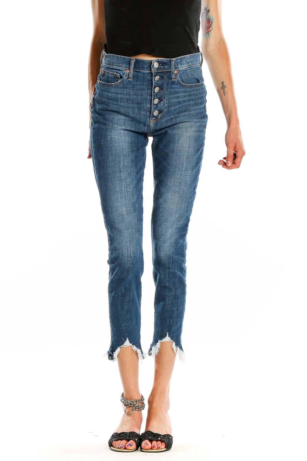 Front view of Gap blue cropped jeans with button-fly closure and raw hem