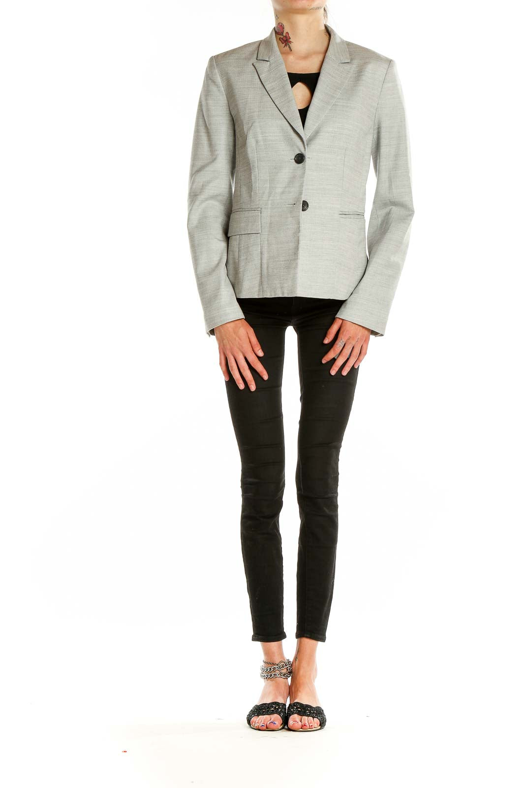 Front view of light gray Banana Republic blazer with two-button closure