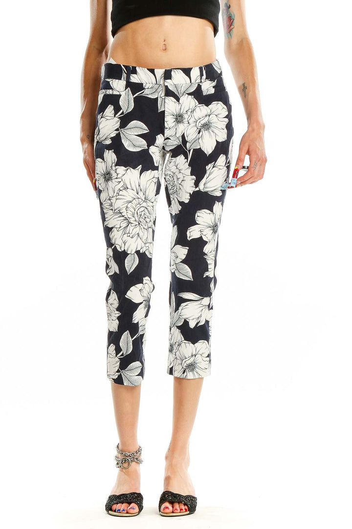 Front view of Banana Republic Navy Floral Print Cropped Pants with white floral pattern