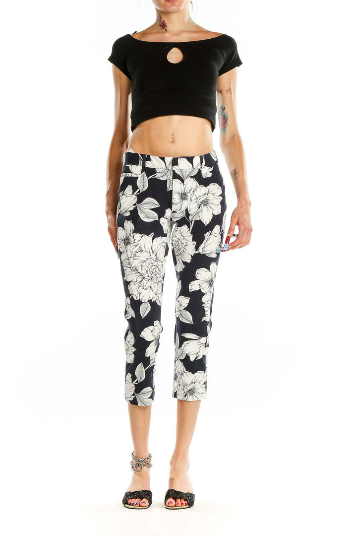 Front view of Banana Republic Navy Floral Print Cropped Pants with white floral pattern