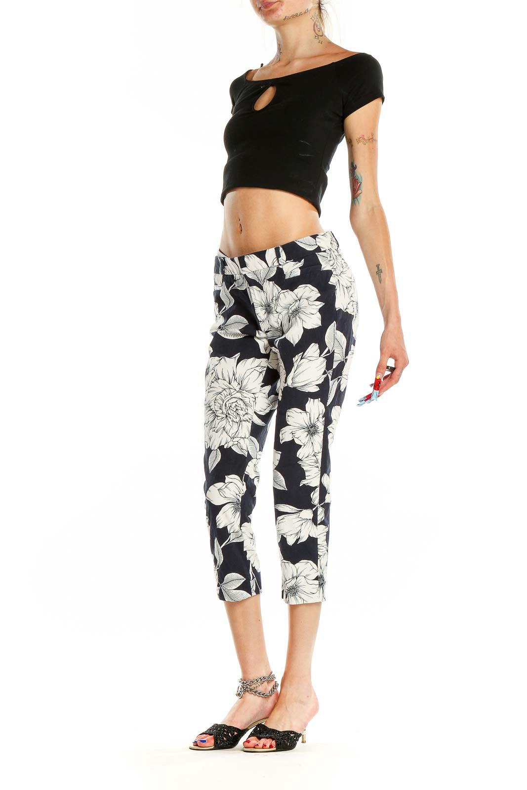 Front view of Banana Republic Navy Floral Print Cropped Pants with white floral pattern