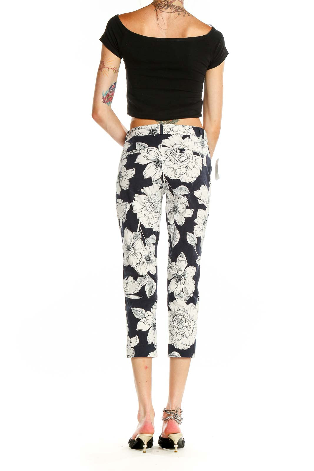 Back view of Banana Republic Navy Floral Print Cropped Pants showing full floral pattern