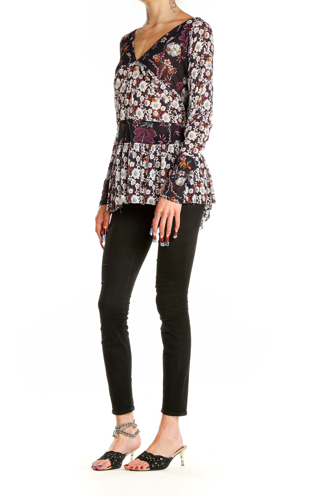 Front view of Free People multicolor floral V-neck tunic top