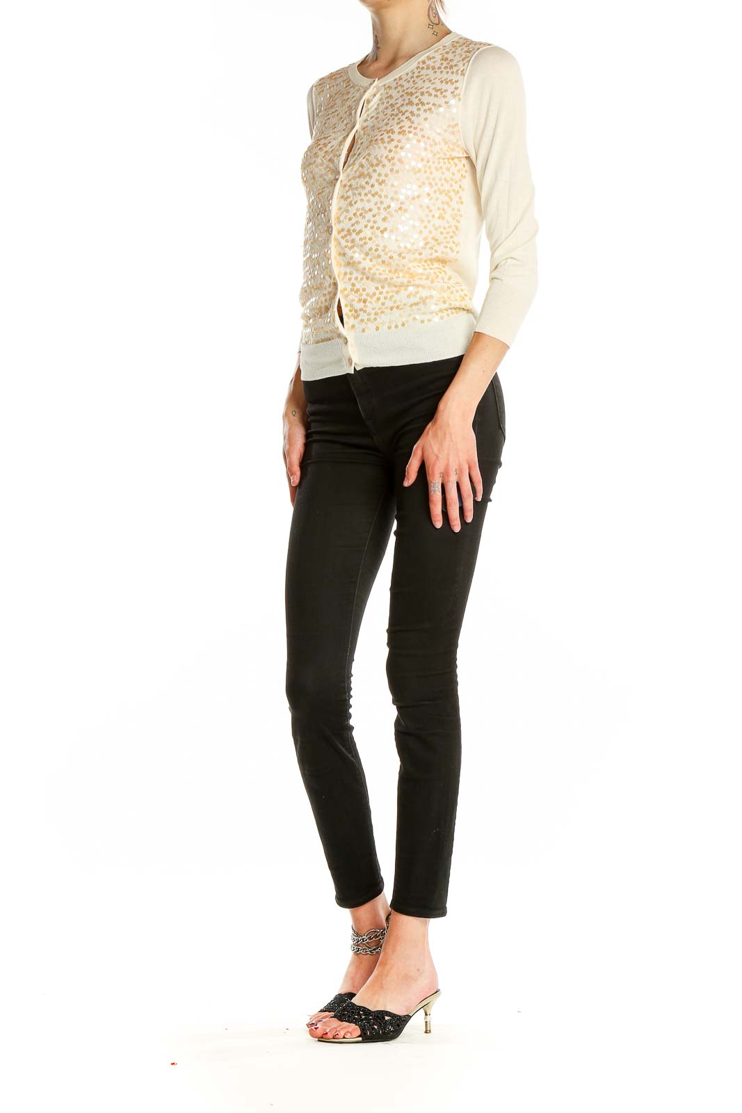 Front view of J.Crew cream cardigan with golden floral embellishments