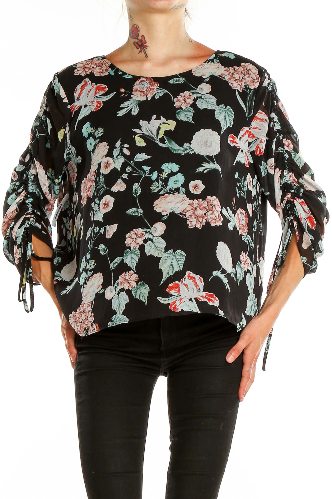 Front view of Vince Camuto black floral print top with ruched sleeves