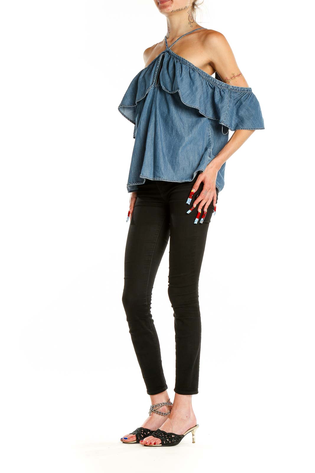 Front view of Express blue denim off-shoulder top with ruffle overlay