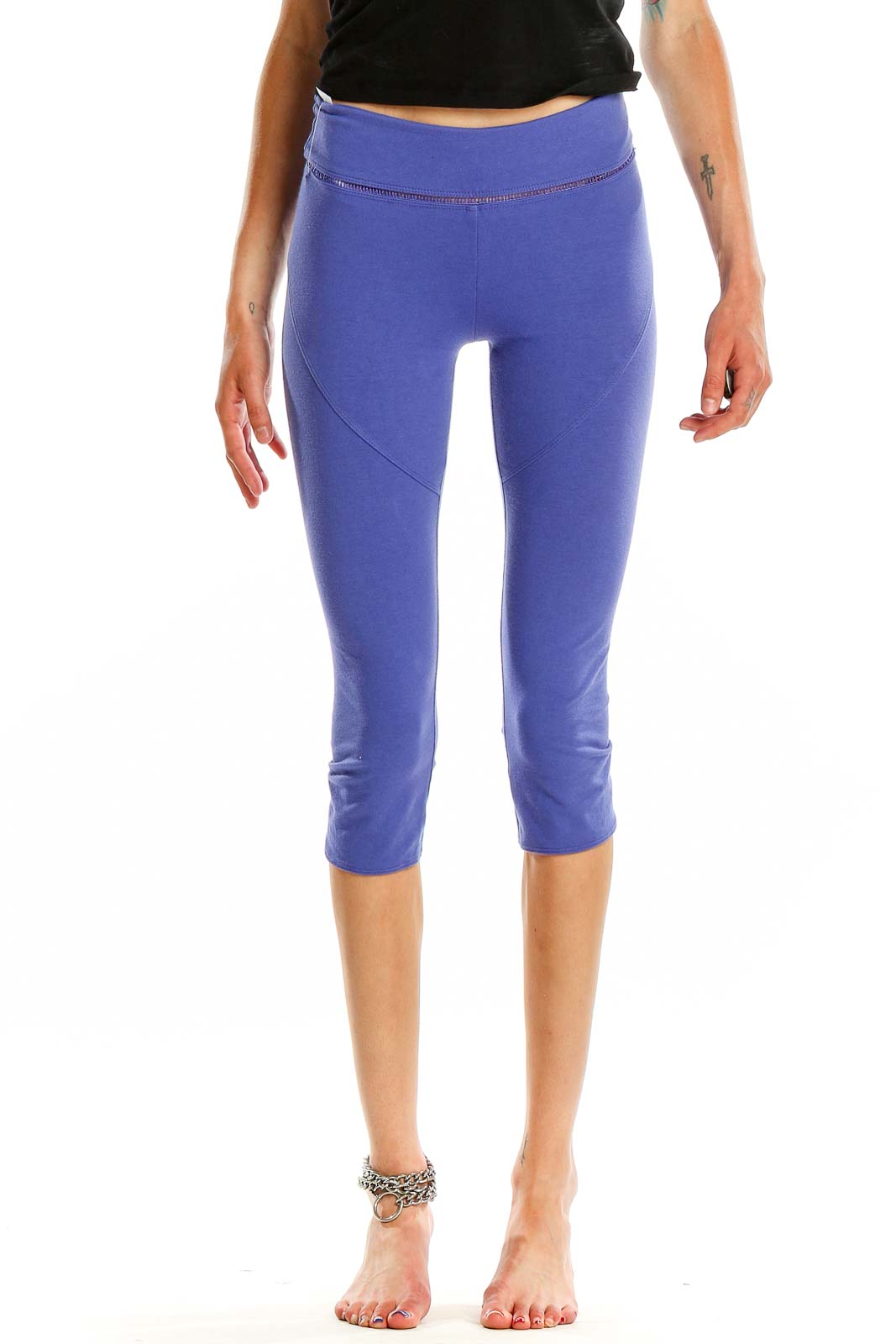 Front view of purple high-waisted capri leggings from Free People Movement