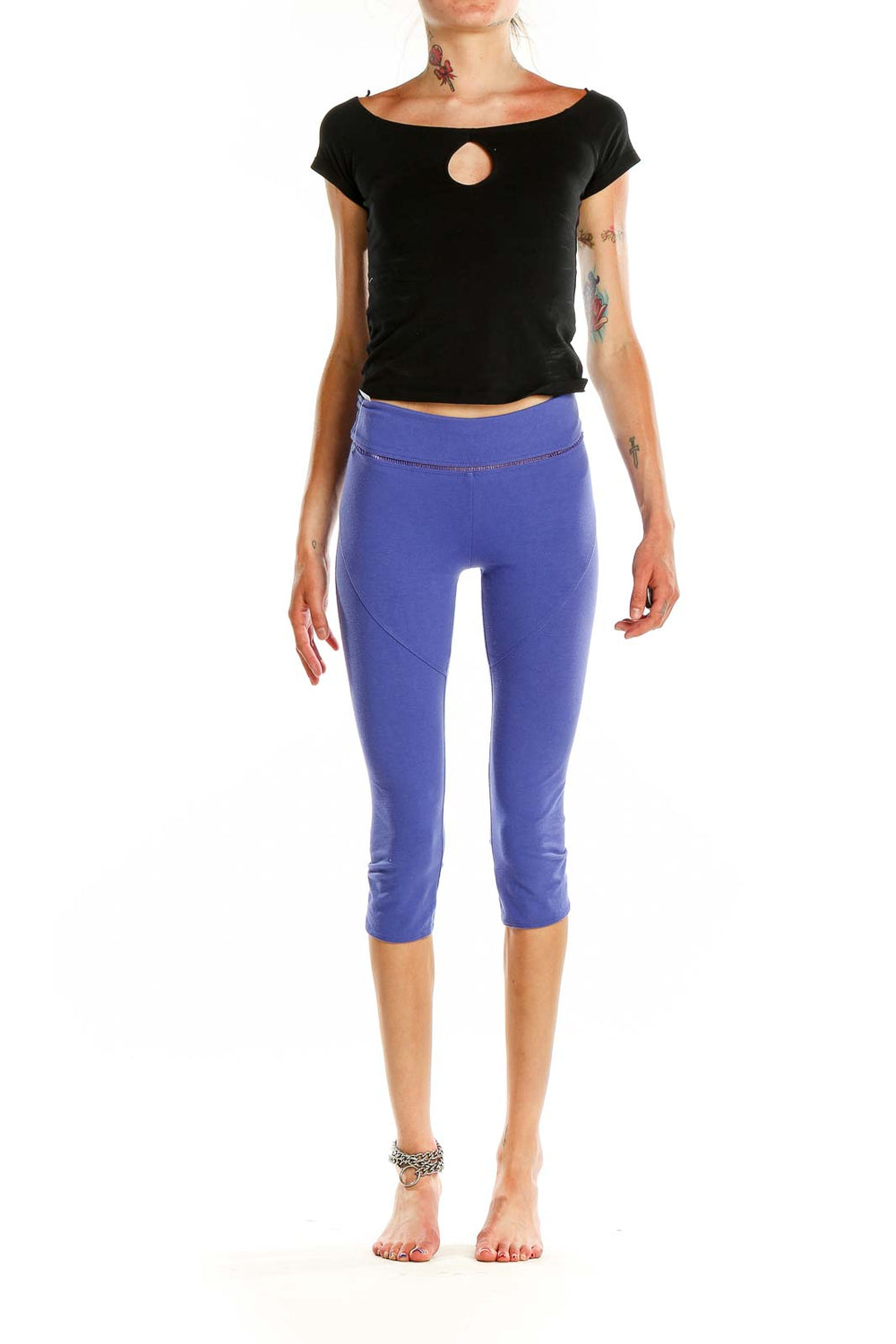 Front view of purple high-waisted capri leggings from Free People Movement