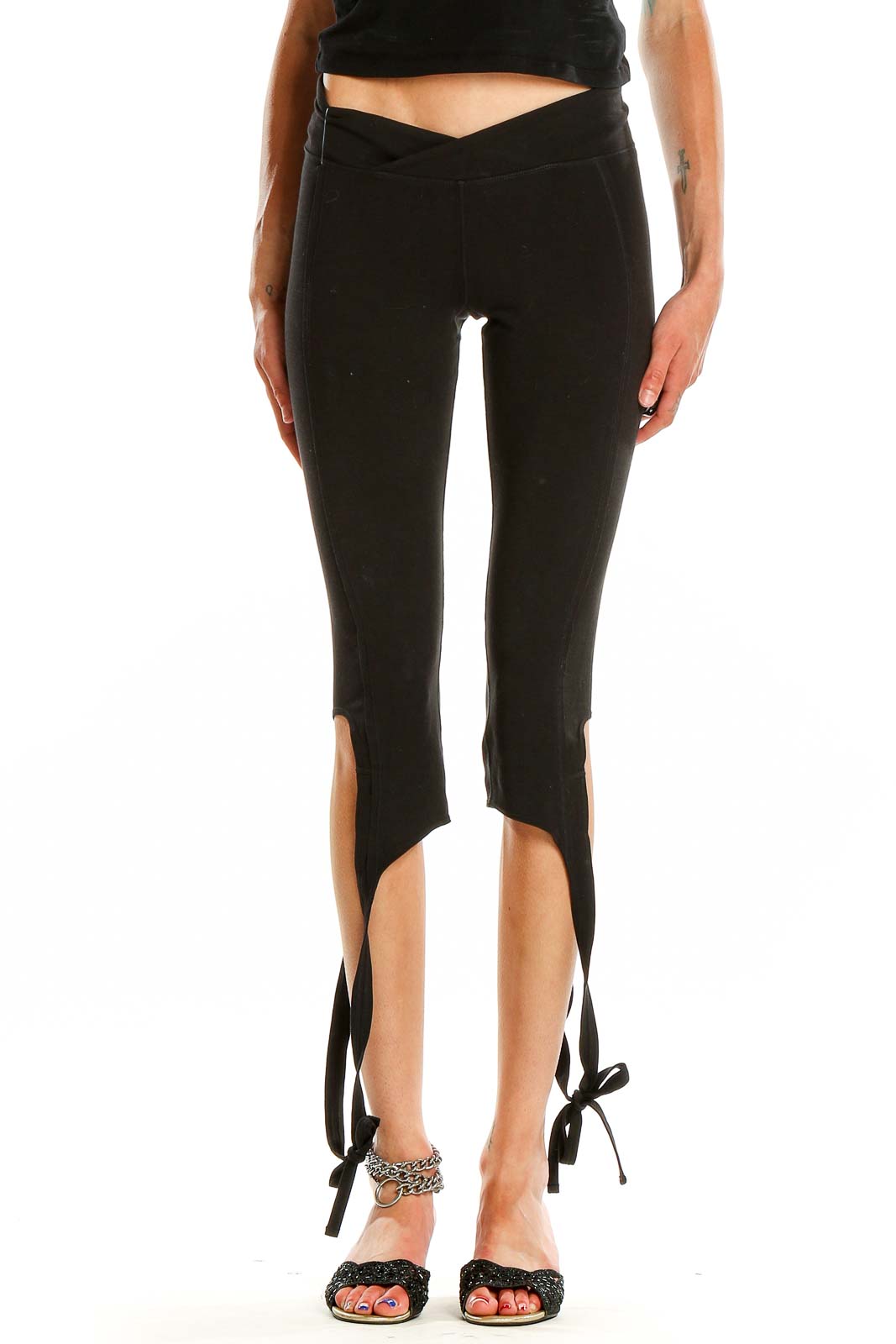 Front view of black tie-ankle activewear leggings from Free People Movement