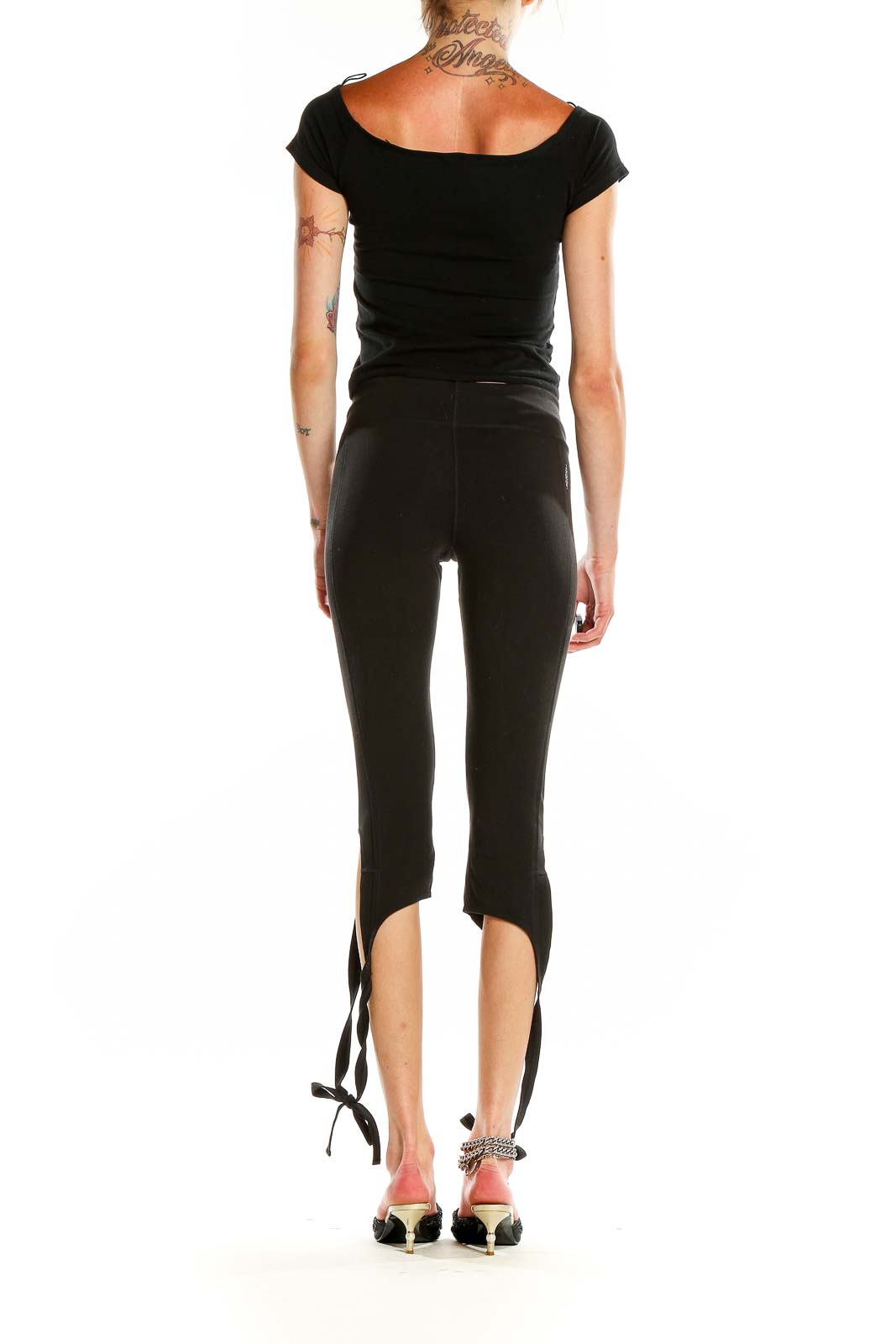 Back view of black tie-ankle activewear leggings from Free People Movement