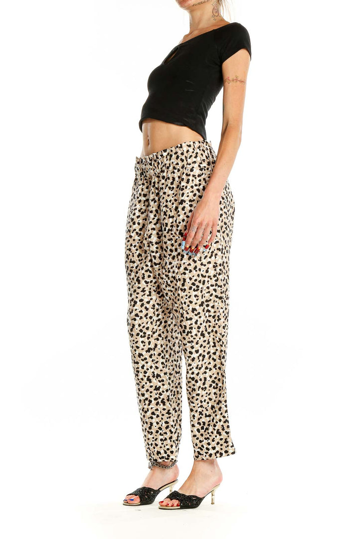 Front view of Ann Taylor beige leopard print wide-leg pants