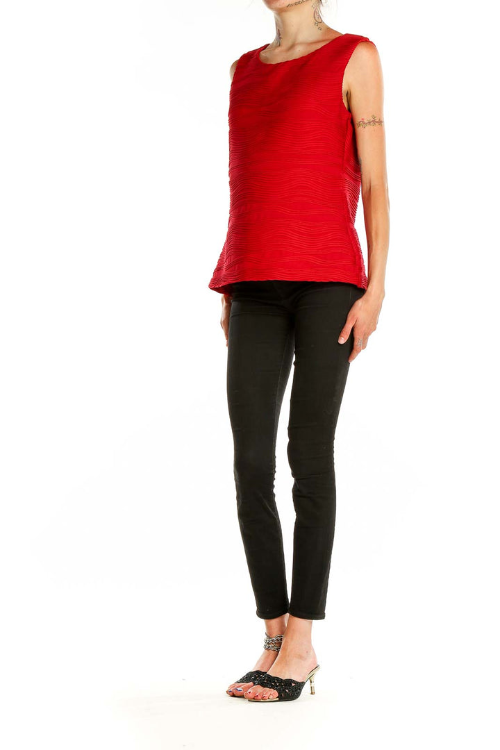 Front view of red textured sleeveless top by Calvin Klein