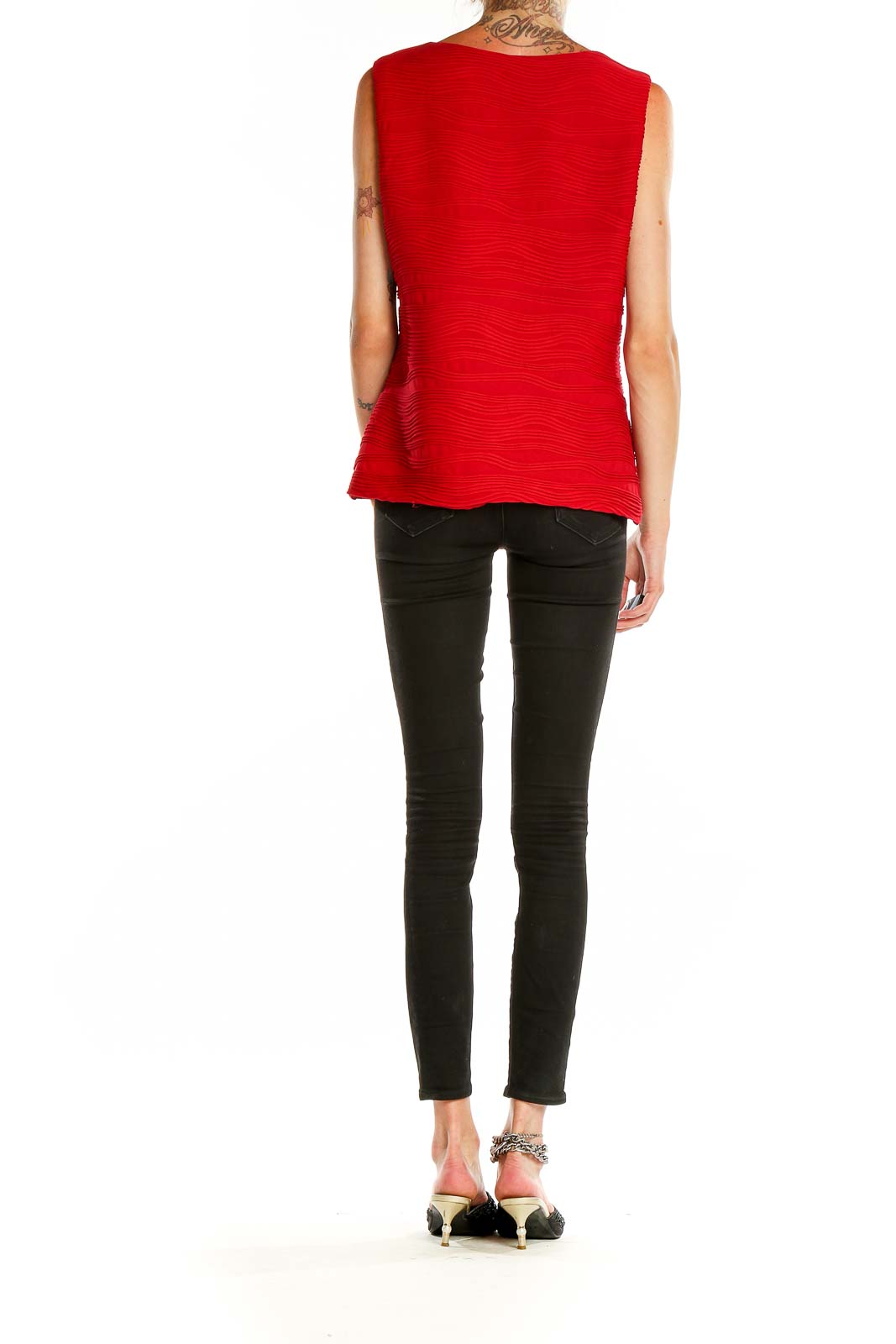 Back view of red textured sleeveless top by Calvin Klein