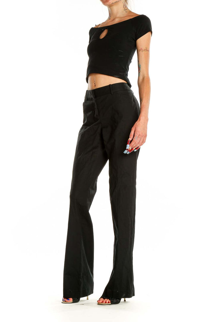 Front view of Theory black wide-leg dress pants on model