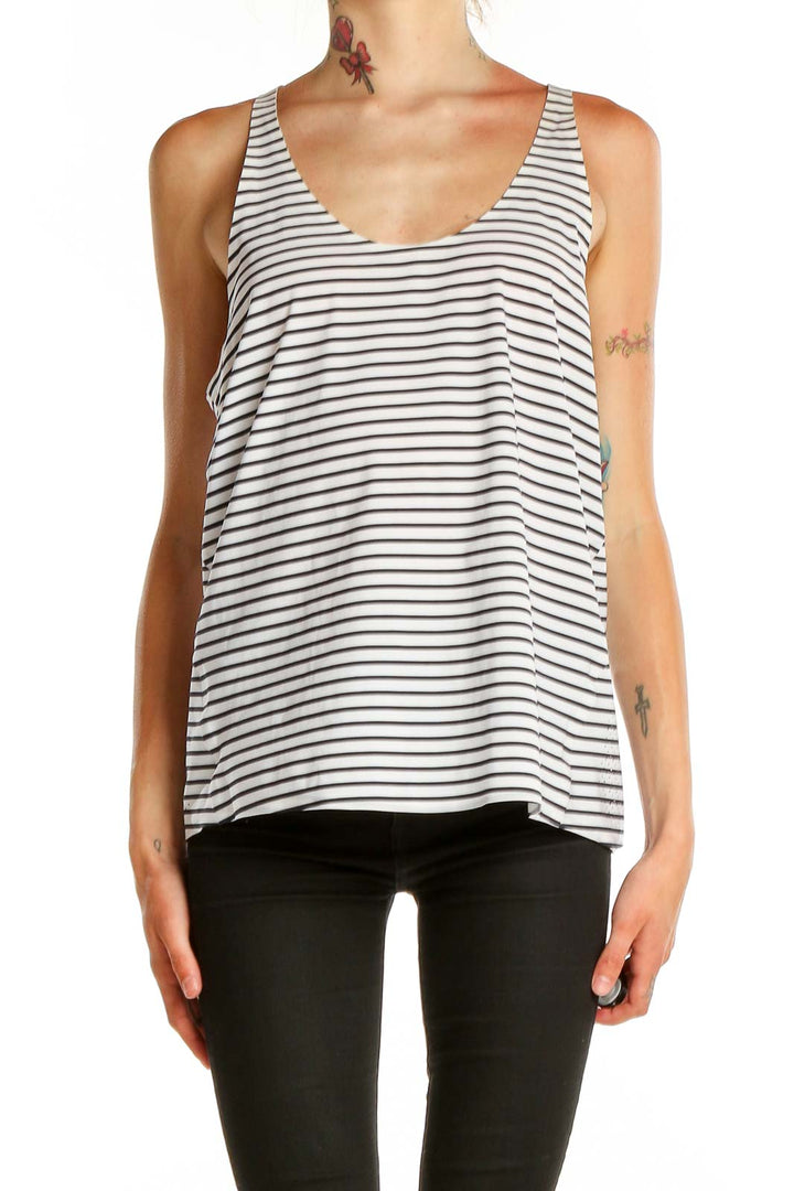 Front view of Aday White and Black Striped Tank Top on model