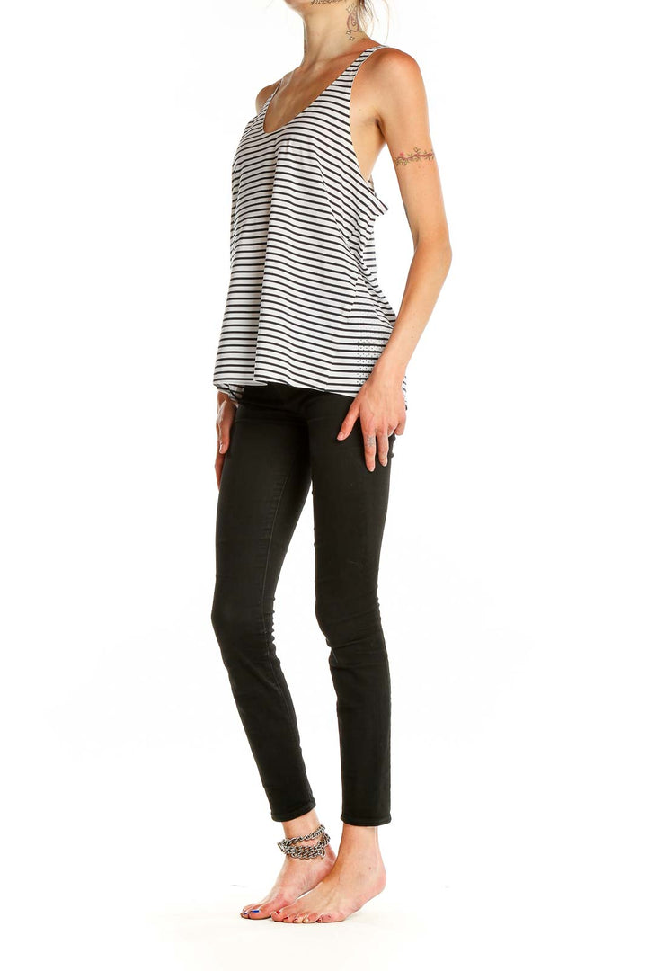 Front view of Aday White and Black Striped Tank Top on model