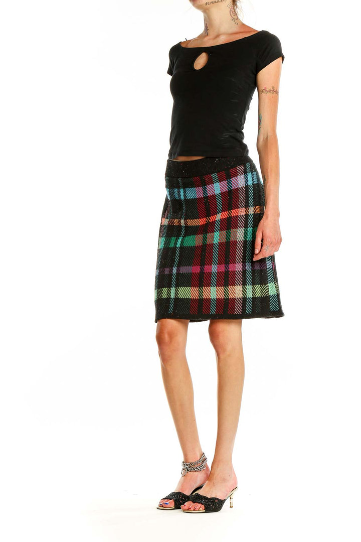 Front view of multicolor plaid wool skirt with sequined waistband