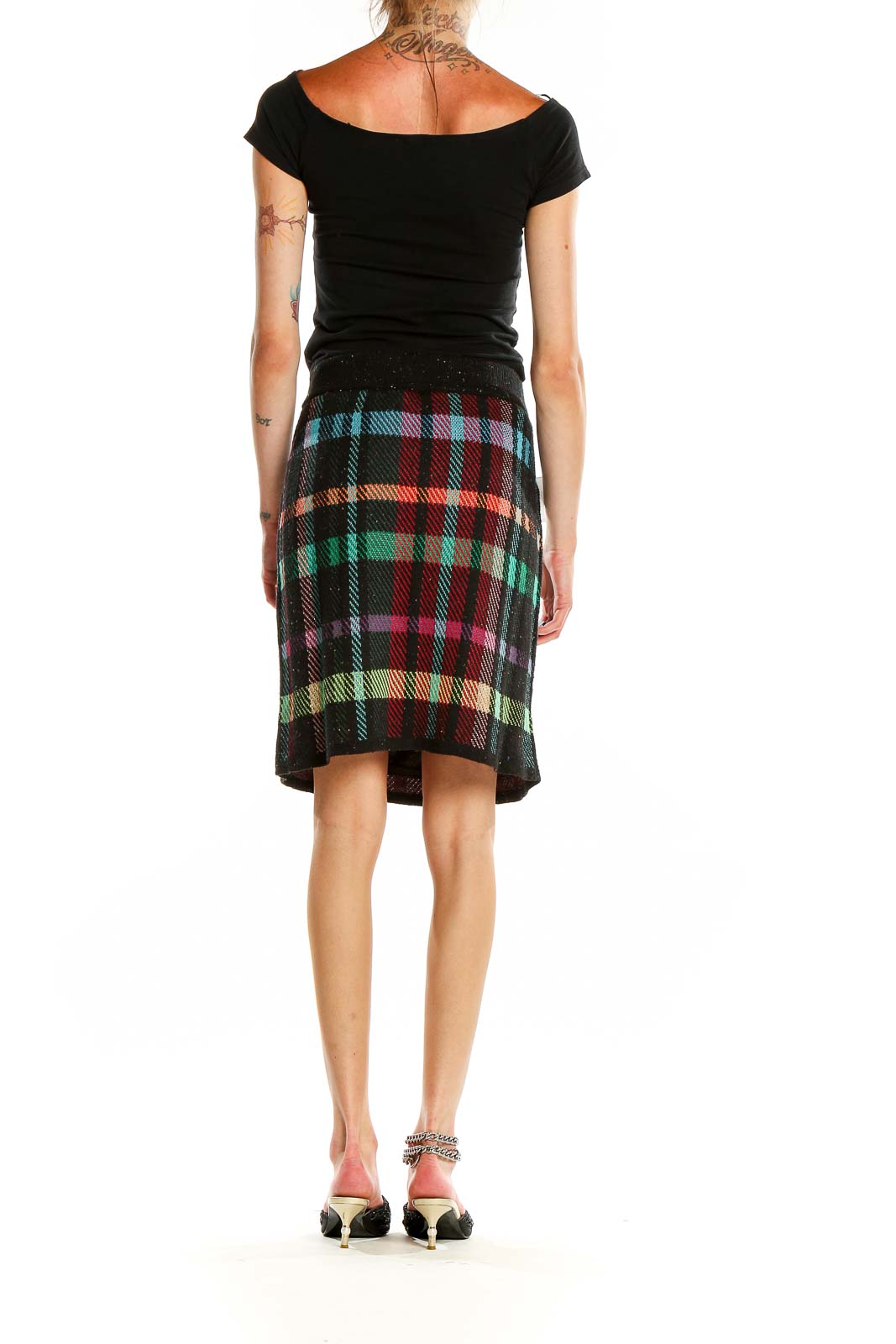 Back view of multicolor plaid wool skirt showing A-line silhouette