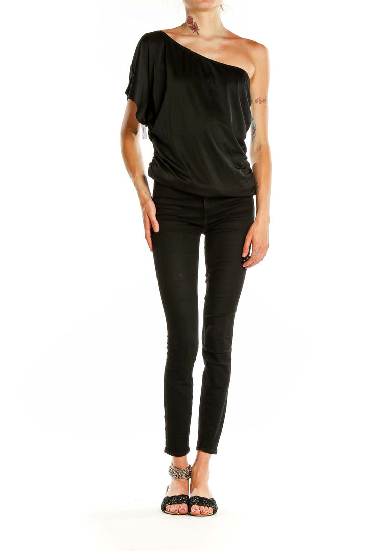 Front view of black one-shoulder draped top by MICHAEL Michael Kors