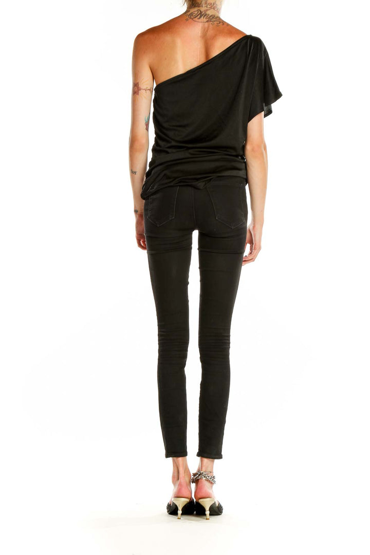 Back view of black one-shoulder draped top by MICHAEL Michael Kors