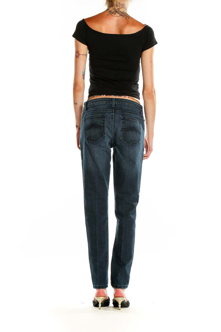 Back view of MICHAEL Michael Kors dark blue straight leg jeans on model