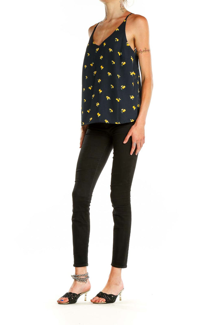 Front view of Banana Republic black camisole top with yellow floral print