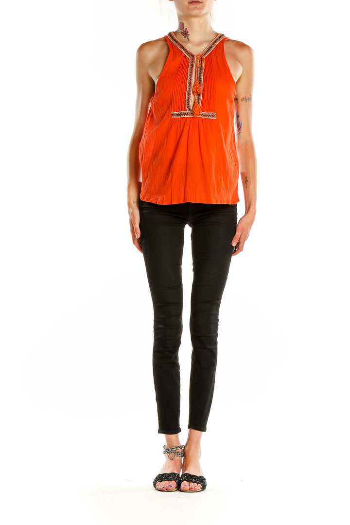 Front view of orange Joie sleeveless blouse with embroidered neckline