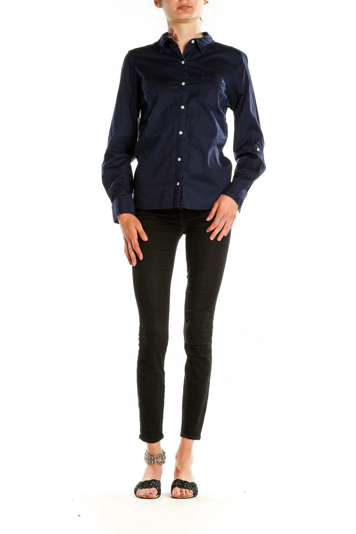 Front view of Tommy Hilfiger navy button-down shirt on model