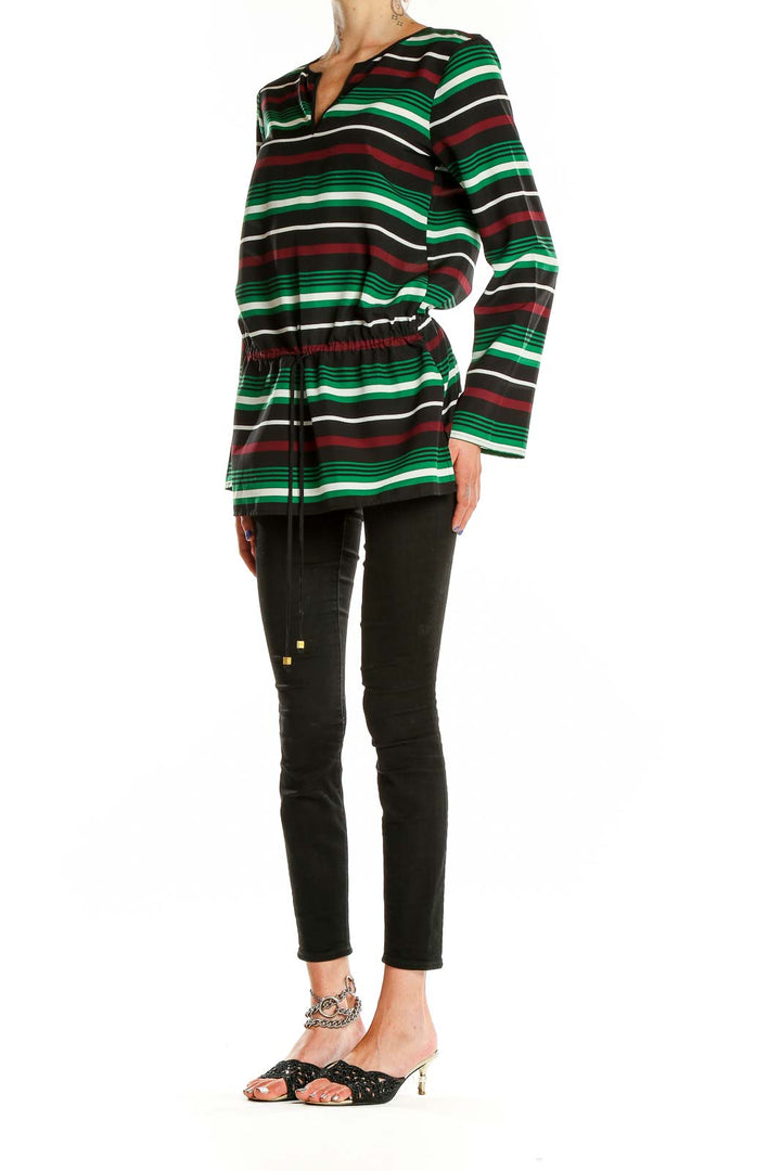 Front view of MICHAEL Michael Kors green striped long sleeve tunic top with V-neck