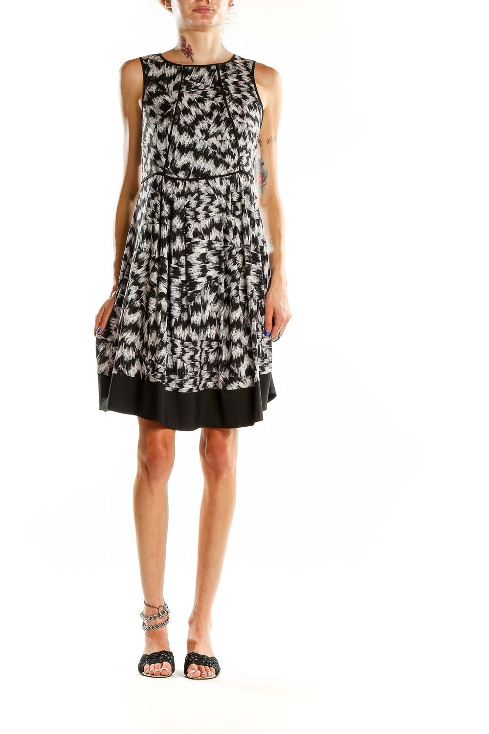 Front view of Vince Camuto black and white abstract print sleeveless dress