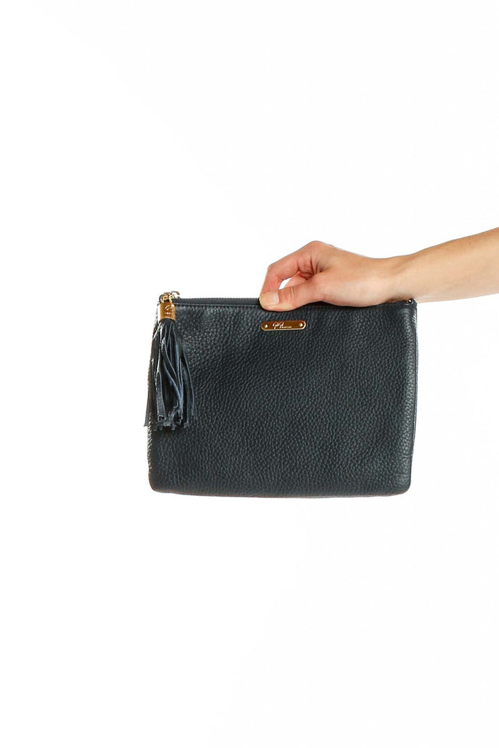 Front view of GiGi New York black leather clutch with tassel