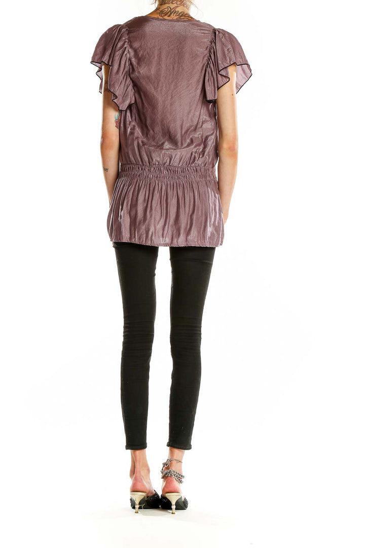 Back view of mauve Rebecca Taylor blouse showing gathered waistband and flutter sleeves