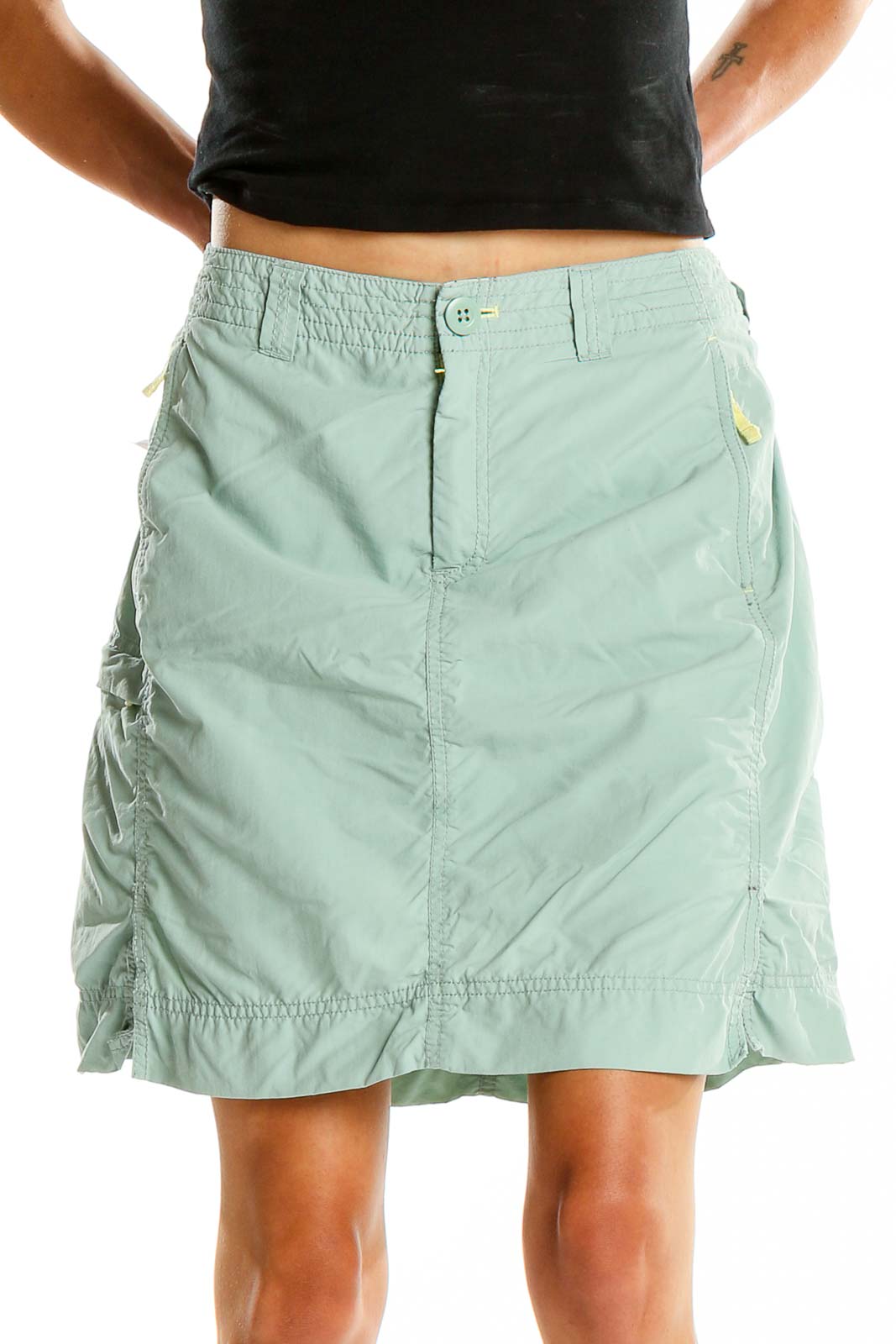 Front view of mint green Eddie Bauer athletic skirt with side ruching