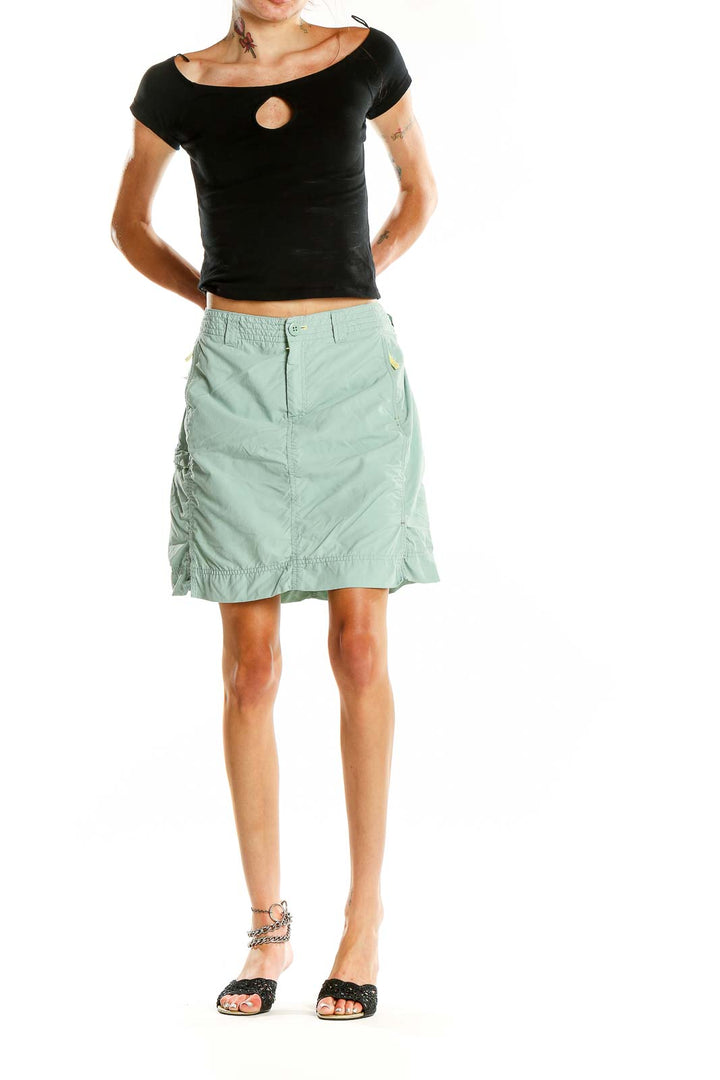 Front view of mint green Eddie Bauer athletic skirt with side ruching