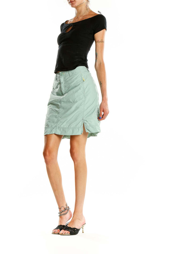 Front view of mint green Eddie Bauer athletic skirt with side ruching