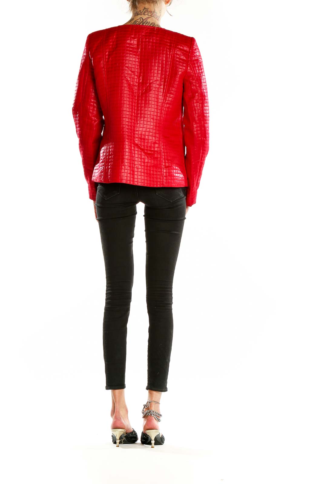 Back view of red quilted zip-up jacket by Valerie Stevens