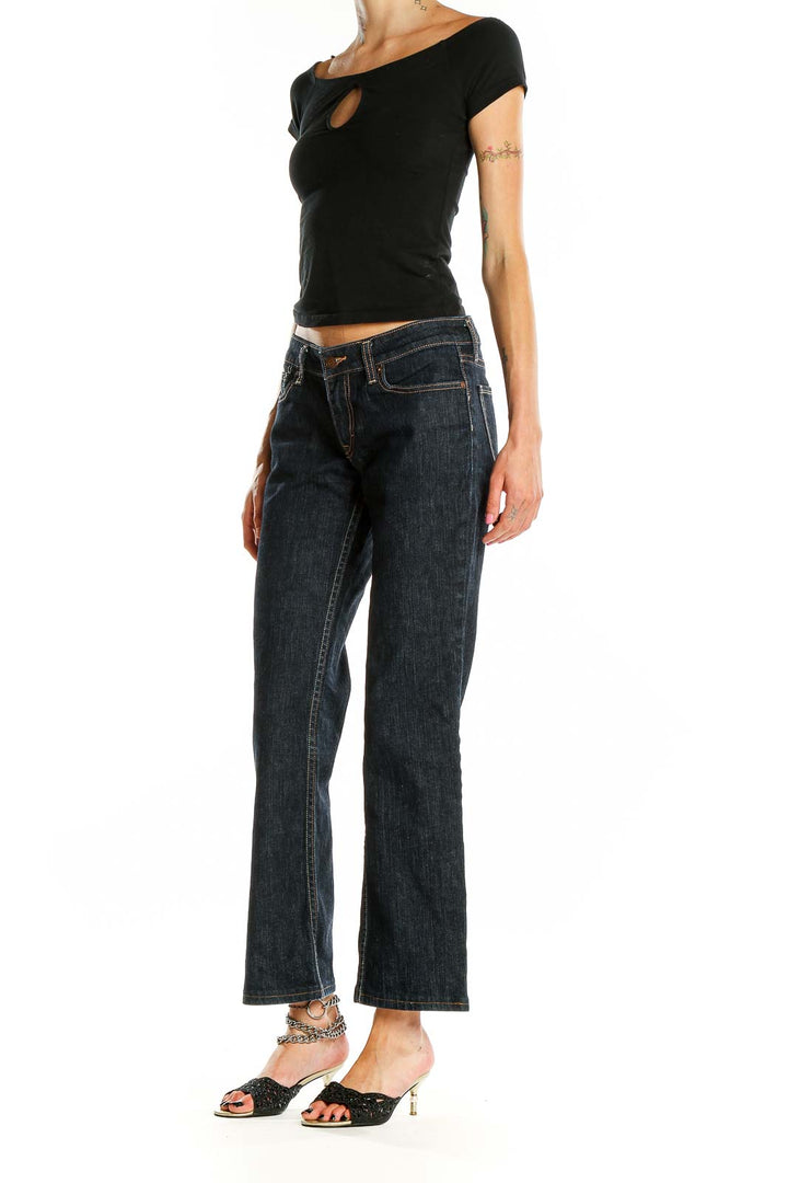 Front view of Banana Republic dark blue bootcut jeans on model