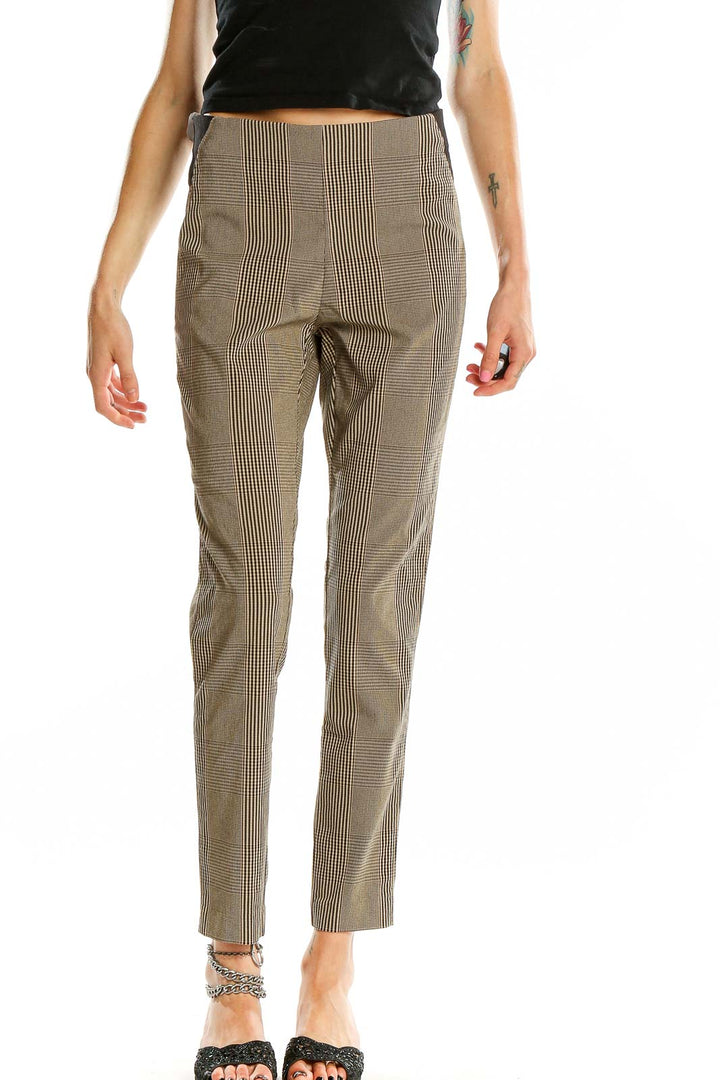 Front view of Calvin Klein beige plaid slim fit trousers on model