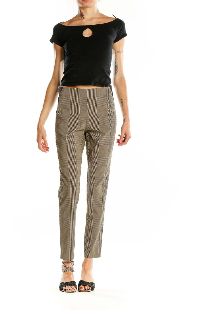 Front view of Calvin Klein beige plaid slim fit trousers on model