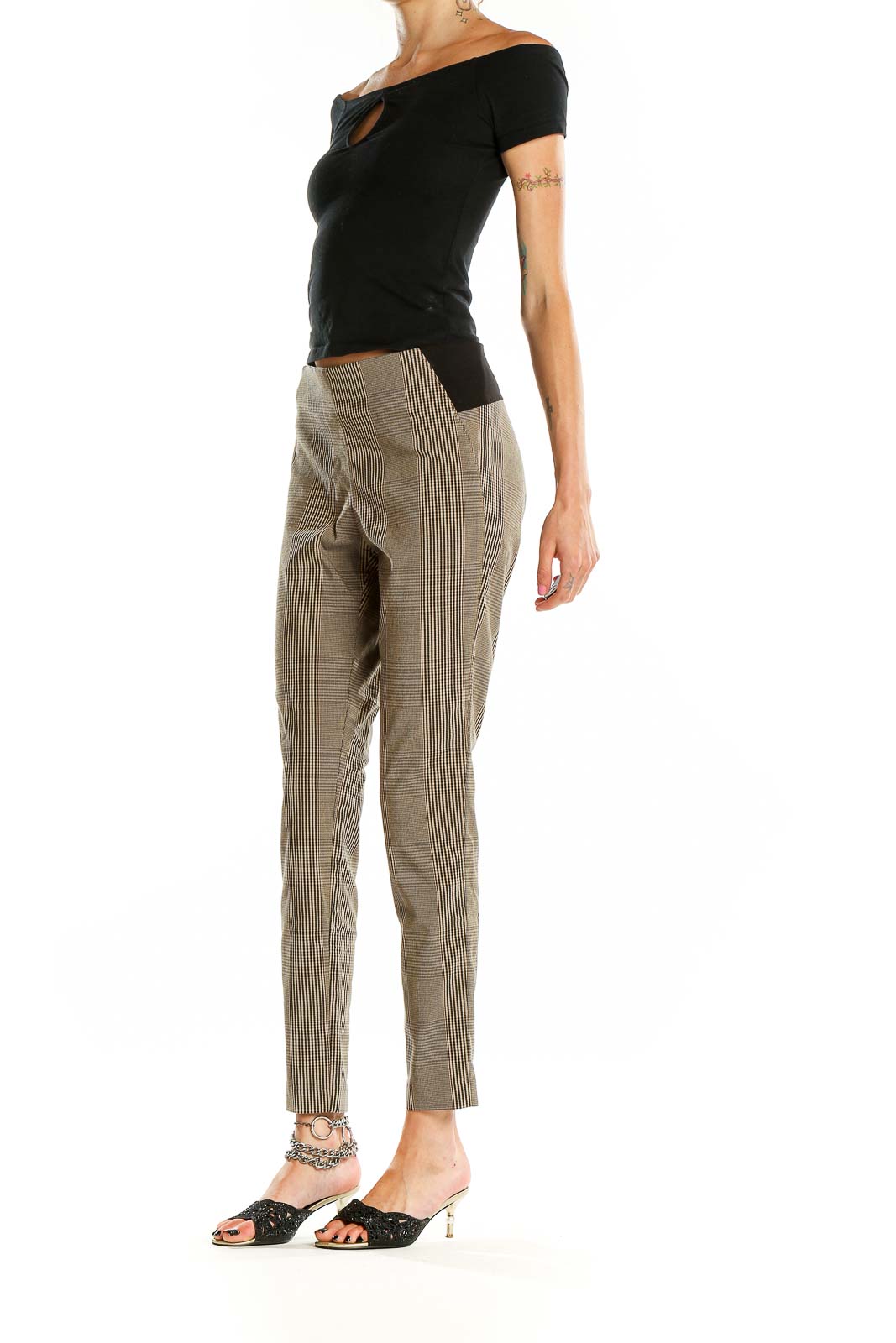 Front view of Calvin Klein beige plaid slim fit trousers on model