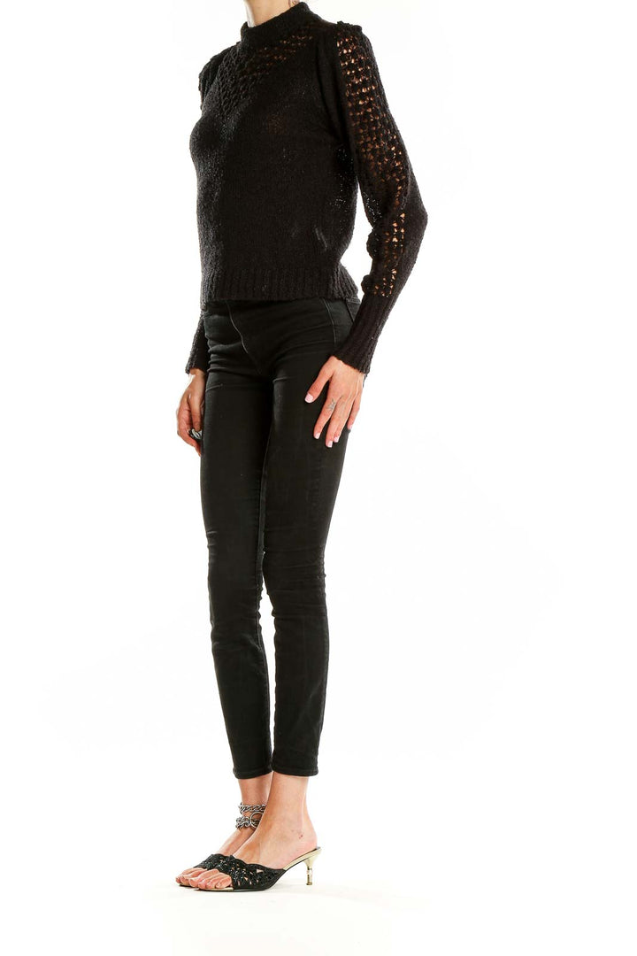 Front view of Saltwater Luxe black crochet knit mock neck sweater