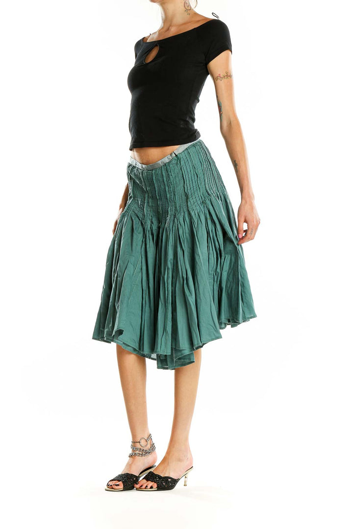 Front view of Calvin Klein green pleated cotton midi skirt