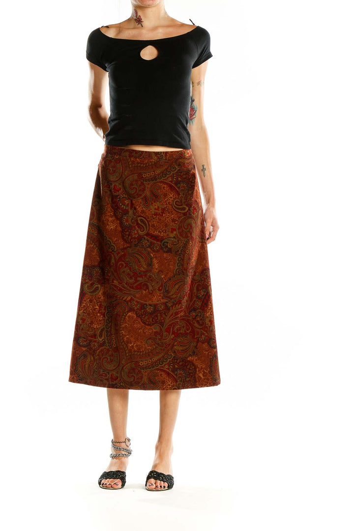 Front view of SilkRoll rust paisley midi skirt with A-line silhouette