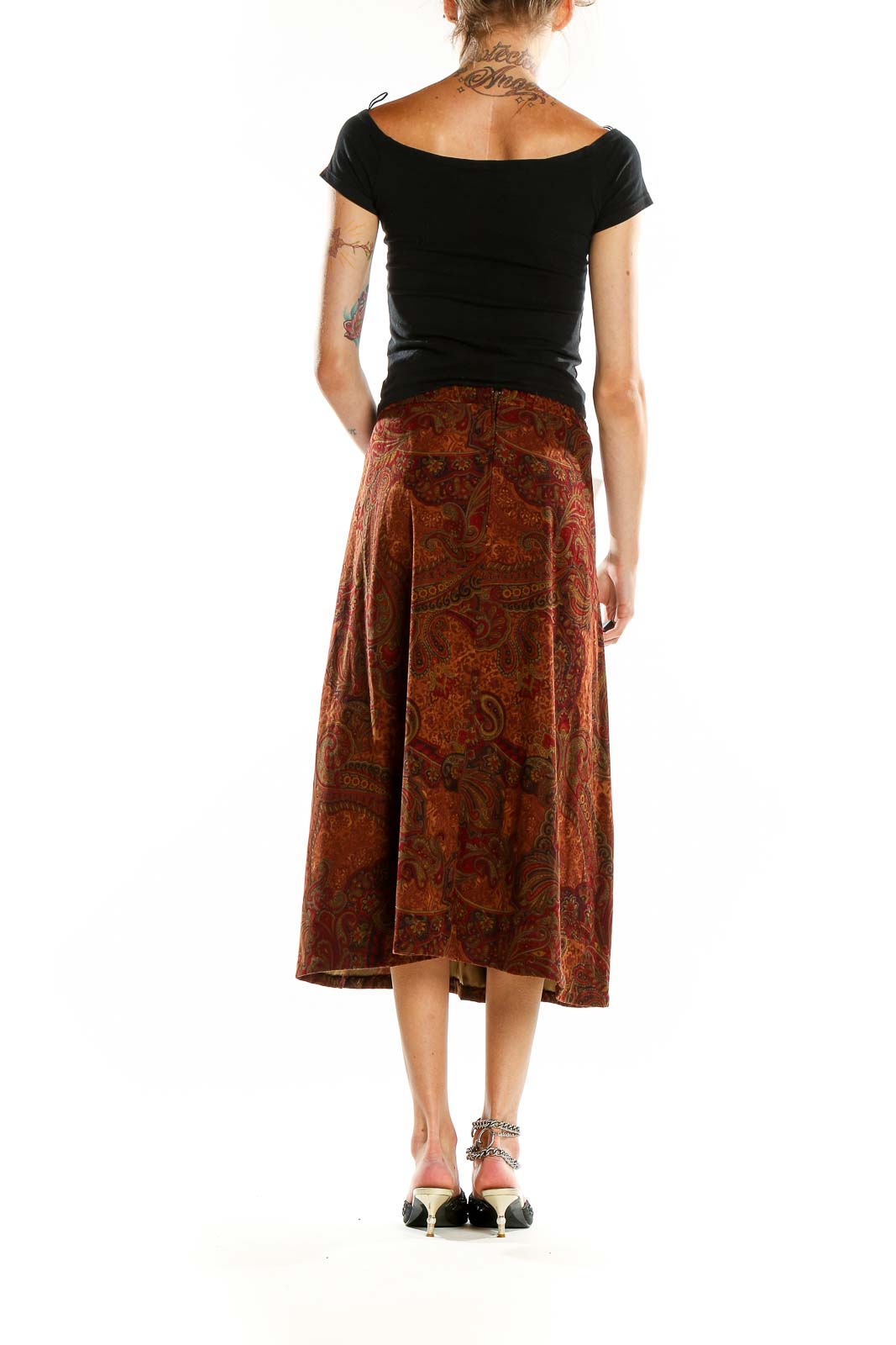 Back view of SilkRoll rust paisley midi skirt showing full length and pattern