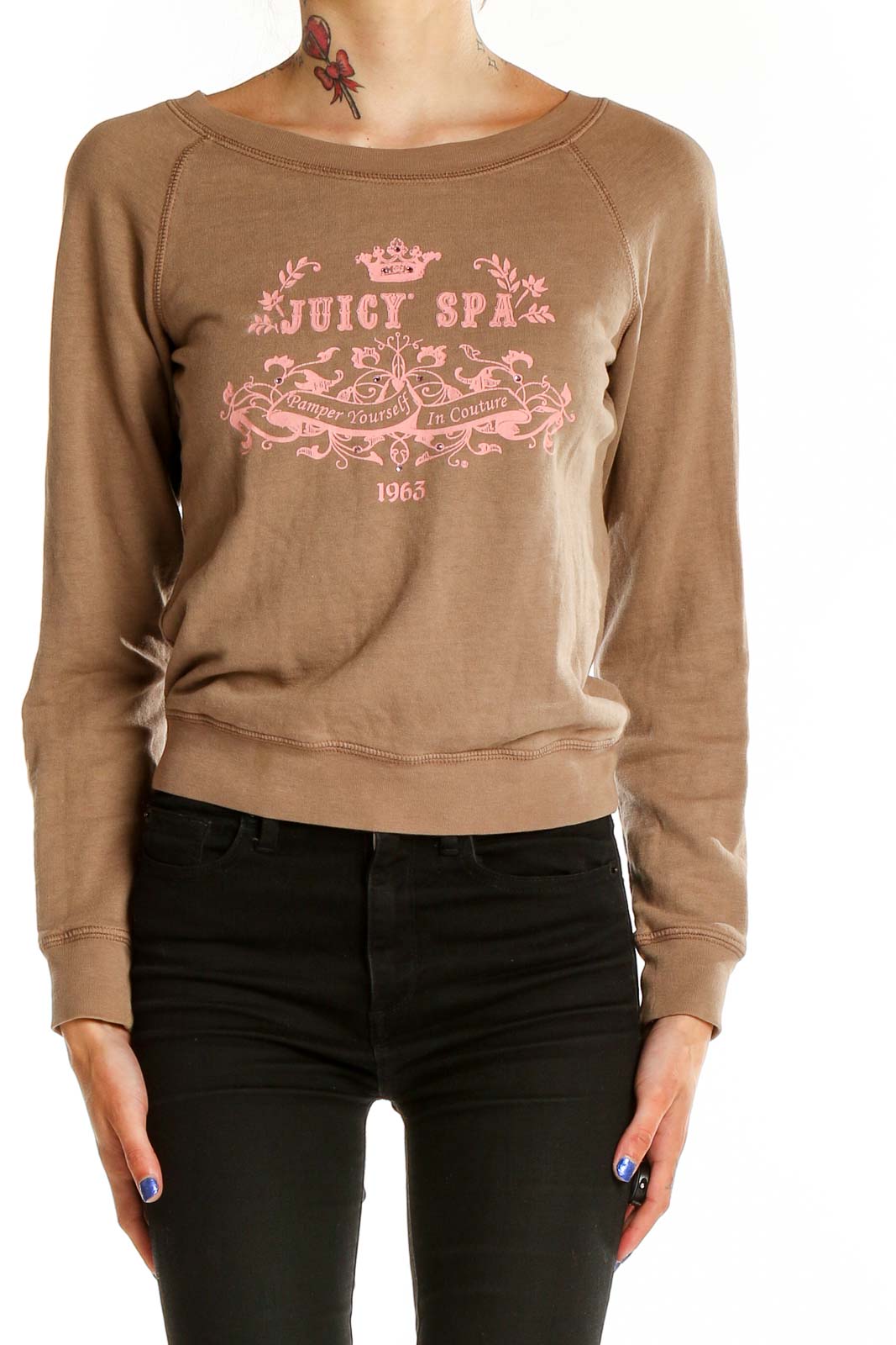 Front view of tan Juicy Couture sweatshirt with pink logo graphic