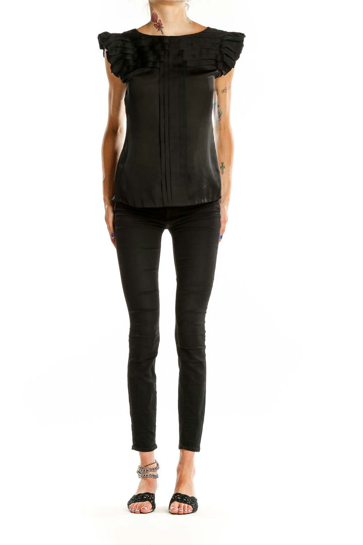 Front view of BCBG MaxAzria black sleeveless blouse with ruffled cap sleeves