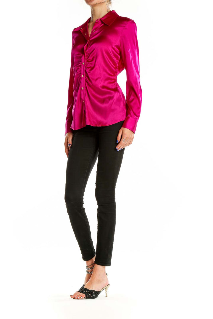 Front view of Cache fuchsia satin button-up blouse with ruched detailing