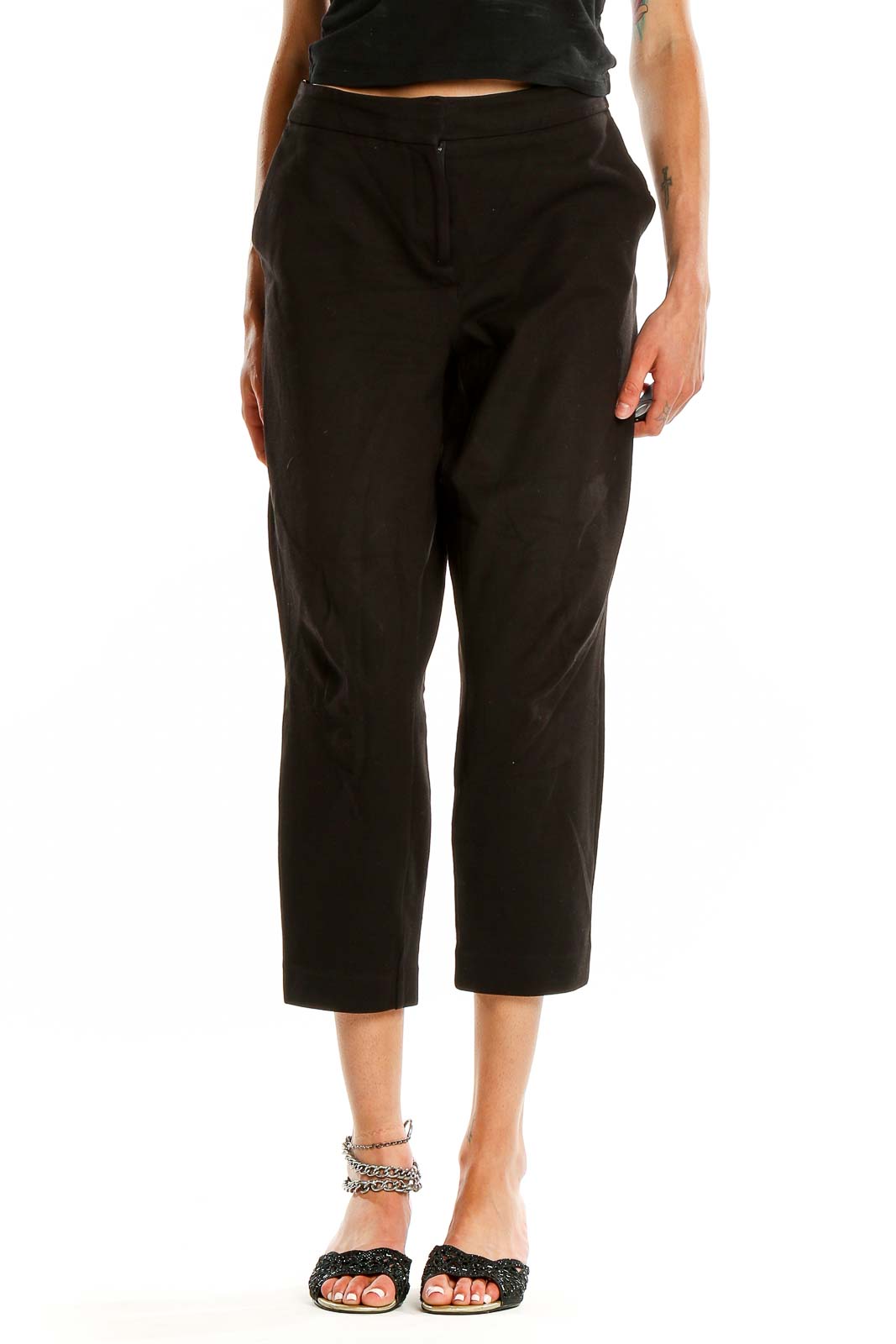 Front view of Boden black cropped tailored trousers on model