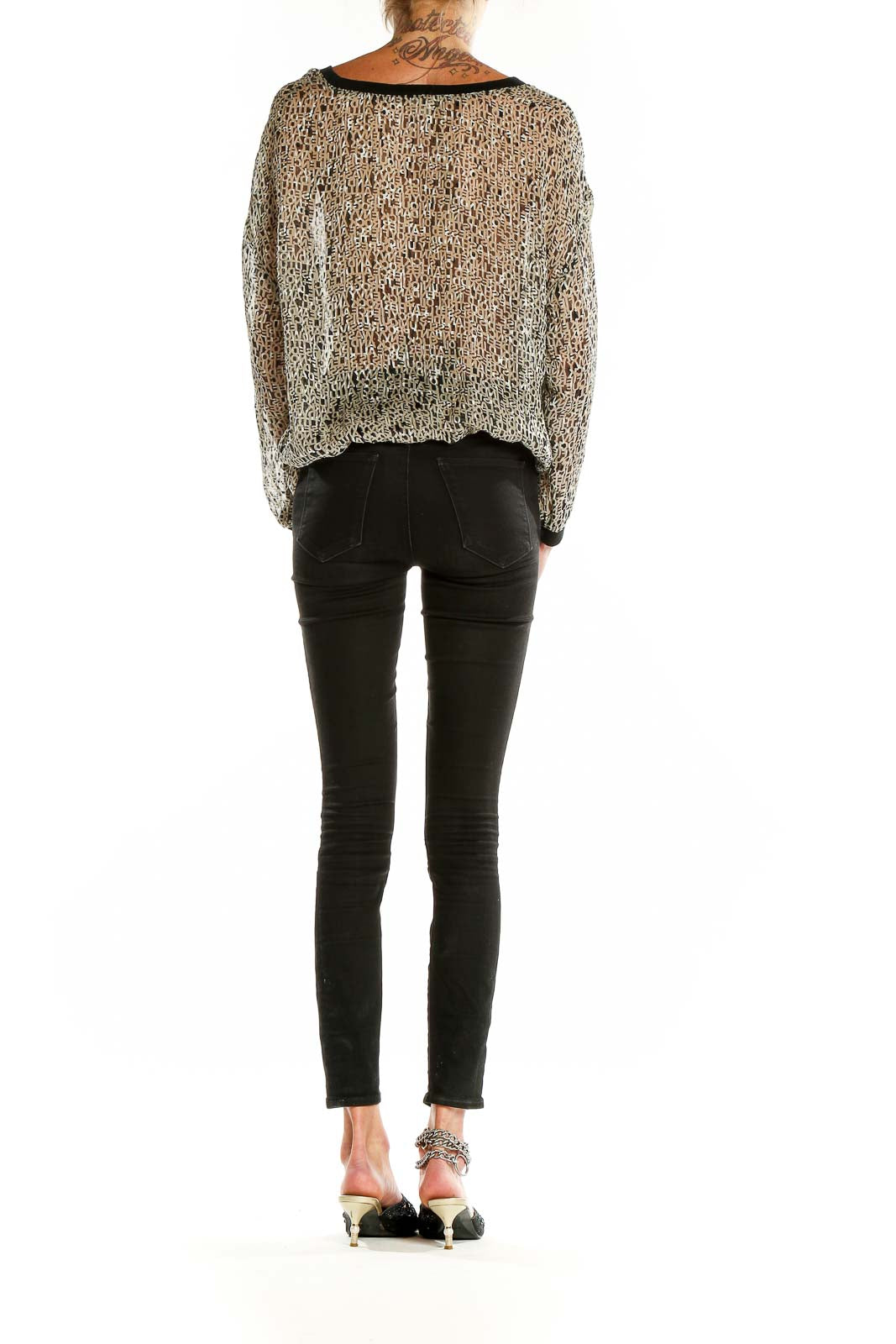 Back view of Silence + Noise beige leopard print sheer blouse showing relaxed fit